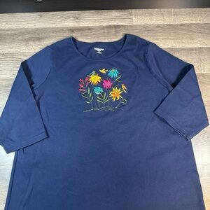 Breckenridge woman’s Navy Top with Colorful Floral Embroidery